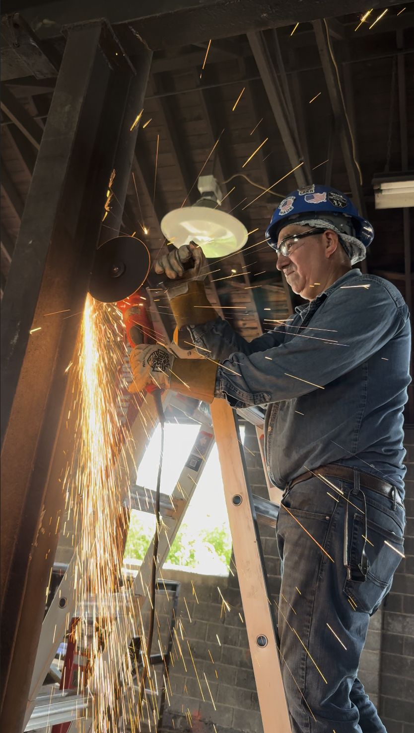 Grinding steel on a structural job