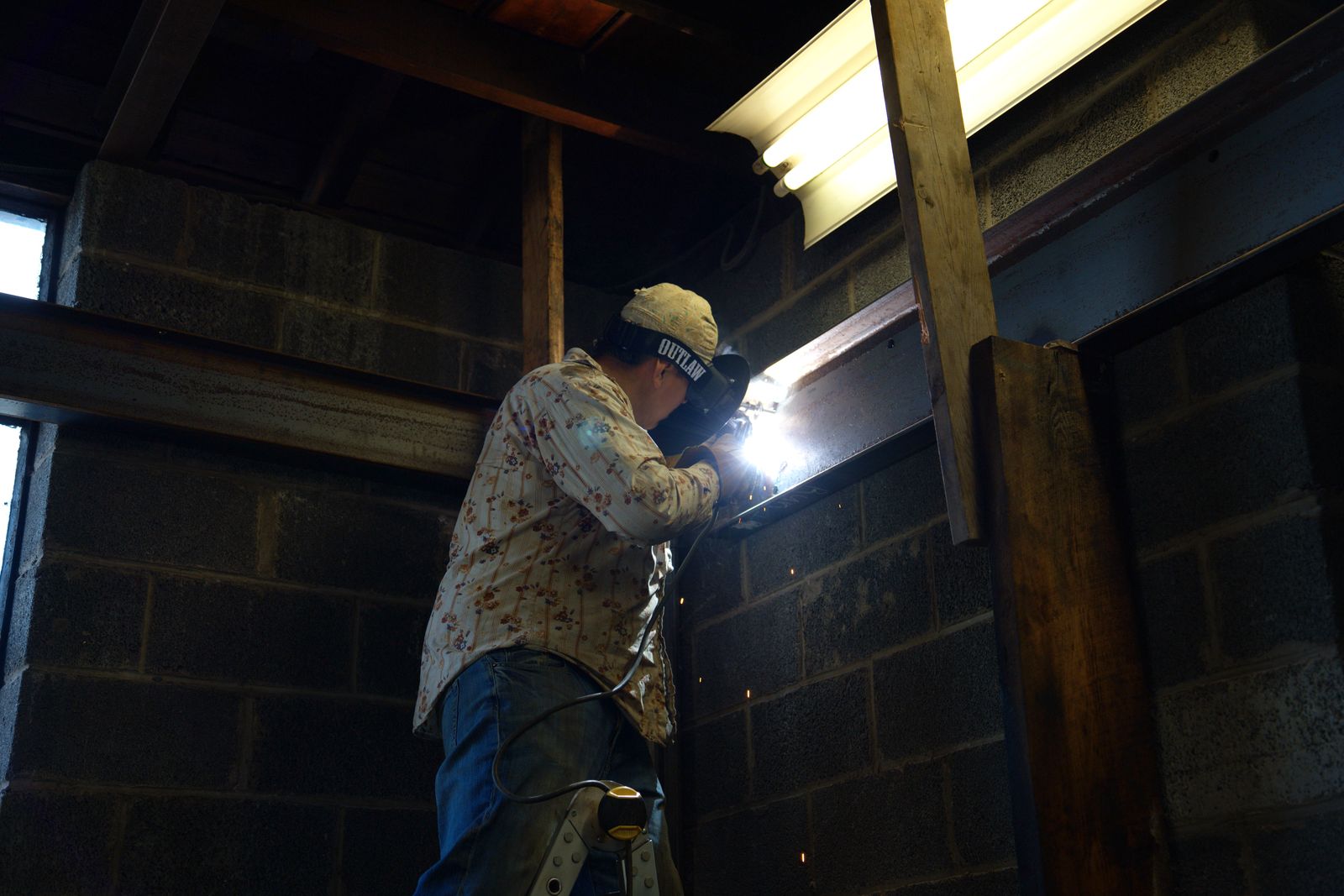 Welding steel on a block wall